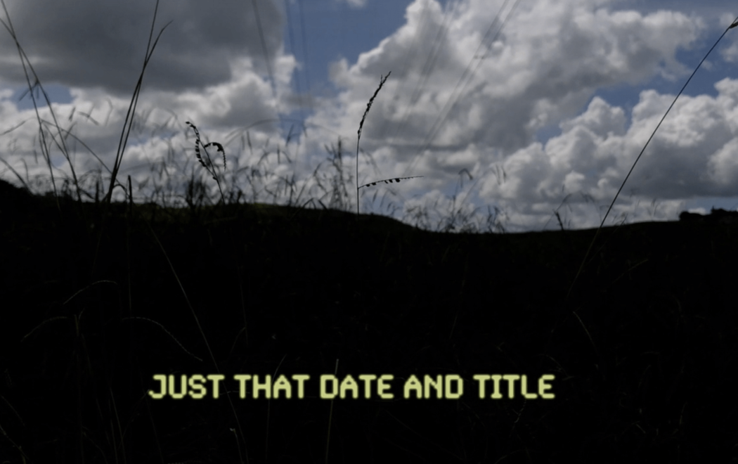 A landscape scene with yellow text that reads 'Just that date and title'